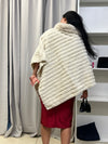 PELS PONCHO