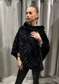PELS PONCHO