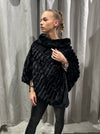PELS PONCHO