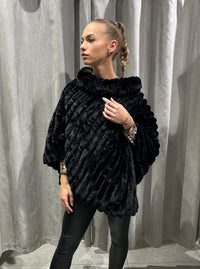 PELS PONCHO