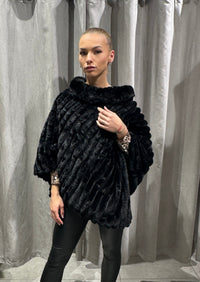 PELS PONCHO